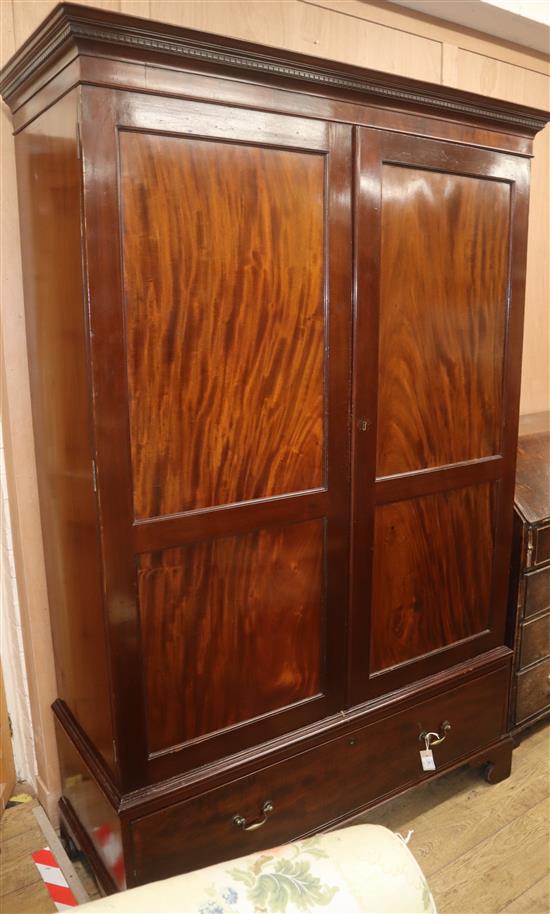 An Edwardian mahogany wardrobe fitted drawer to base W.134cm